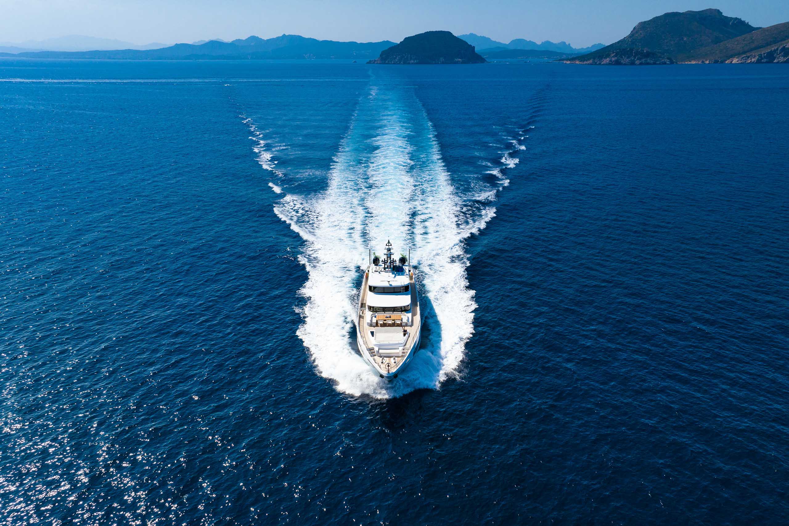 Aerial drone perspective luxury yacht Mediterranean wake Lérins Islands - Azur Photo Yacht